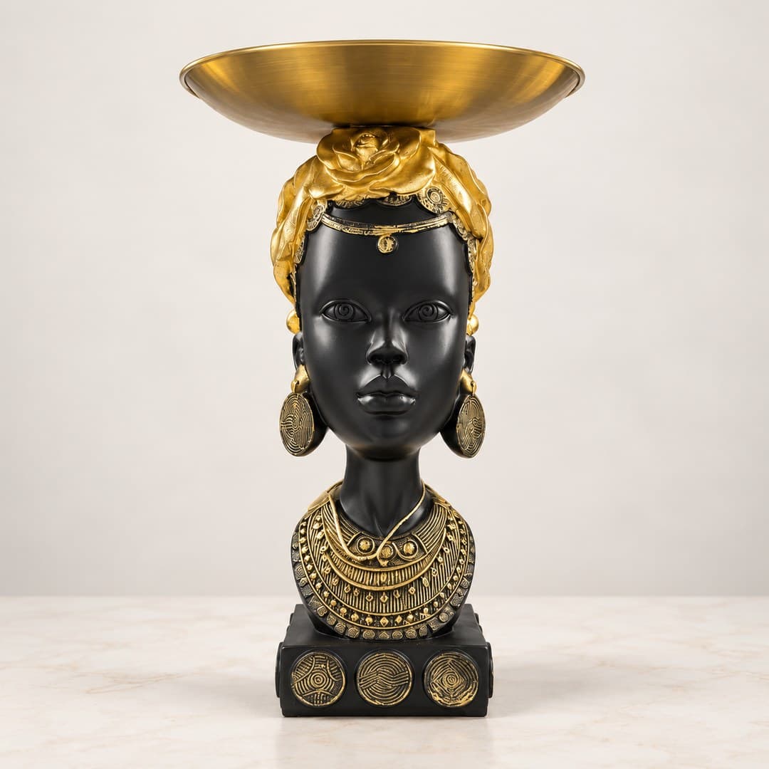 black and gold-tone portrait bust centerpiece topped by a shallow decorative bowl
